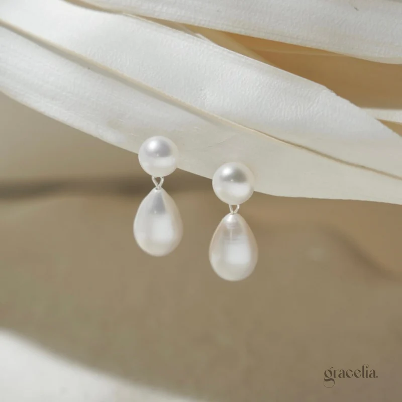 Oceane Double Pearl Drop Earrings: Delicate Bestseller Charm.